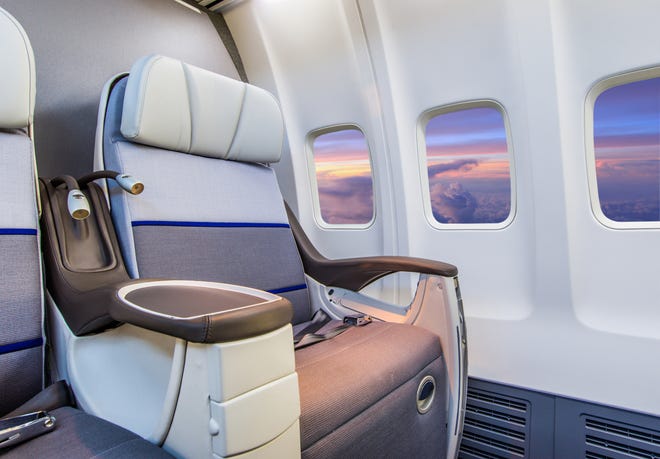 Consider splurging on first-class or business seats. In most cases, the armrests on these seats can ' t be lifted either but the roomier seat means you may not need them to.