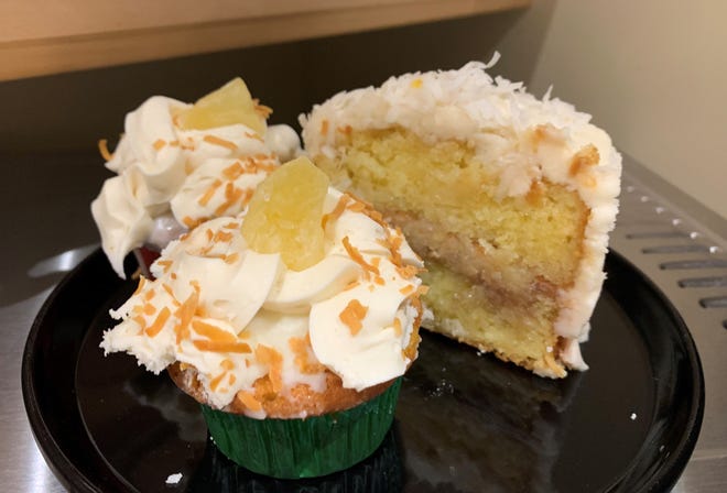 A coconut cake slice and pineapple cocout cupcakes from Dolce Mare, Marco Island.
