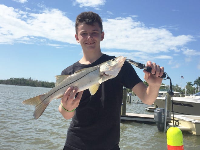 Aaron Monson from Fergus Falls, Minnesota with a catch and release Snook caught off Marco Island.