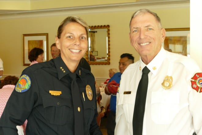 Chief Tracy L. Frazzano of the Marco Island Police Department smiles to the camera during Marco Island Police Foundation's Lunch with the Chief in Island Country Club on Nov. 7. Likewise, chief Michael D. Murphy of the Fire-Rescue Department stands next to her.