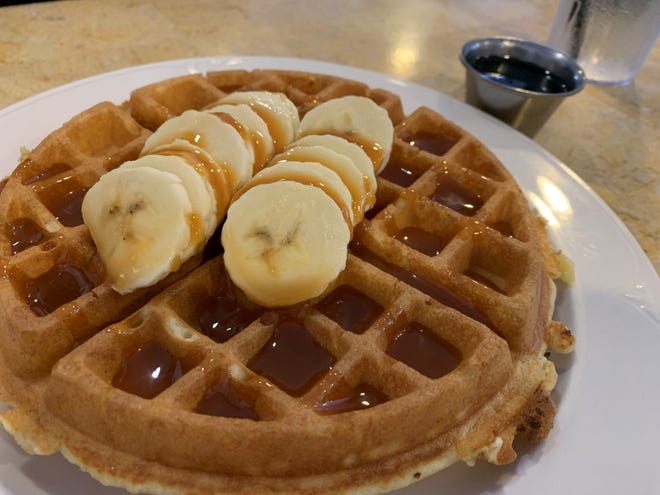 Belgian waffle with bananas and caramel sauce from Petit Soleil, Marco Island.