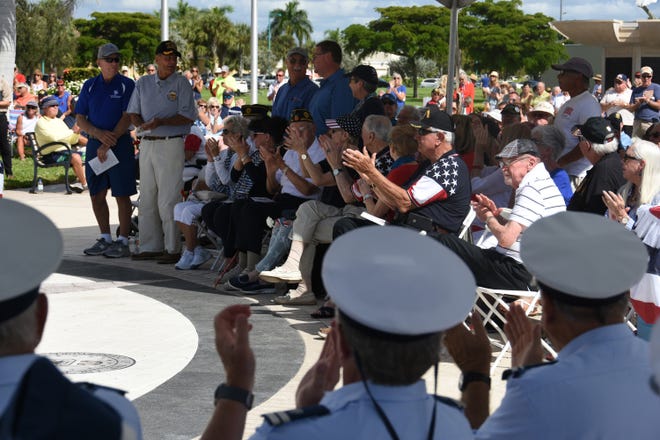Merchant Marine veterans stand to be recognized. Marco Island commemorated Veterans' Day on Monday, with a ceremony at 11 a.m. in Veterans' Community Park.