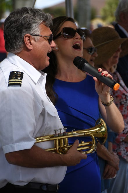 Craig Greusel and Mary Jo O'Regan sing "Proud to Be an American." Marco Island commemorated Veterans' Day on Monday, with a ceremony at 11 a.m. in Veterans' Community Park.