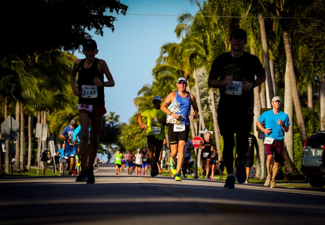(Center)Jeremy Barton, LaSalle, ON, makes his way to the finish line with a hand full of runners.  last new Moments from the 2020 Naples Daily News  Half Marathon. The Naples Daily News Half Marathon is connected to the Olympic Games. Sunday, a handful of competitors attempted to qualify for the Olympic Trials through their finish. The race started and finished near Cambier Park in Downtown Naples.