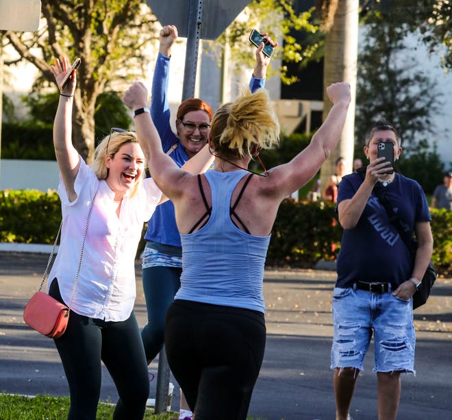 Hannah Brazell, Portland, ME, reacts to her friends cheering her on just before the finish line. Moments from the 2020 Naples Daily News  Half Marathon. The Naples Daily News Half Marathon is connected to the Olympic Games. Sunday, a handful of competitors attempted to qualify for the Olympic Trials through their finish. The race started and finished near Cambier Park in Downtown Naples.