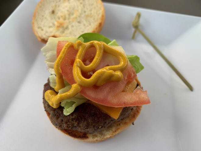 Closeup of a mini angus slider (mustard added) from Hammock Grill, South Naples.