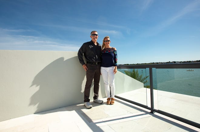 Jim Prange, right, and daughter Nikki Prange-Carroll with Sotheby's International Realty pose for a portrait at a home recently built, Tuesday, Feb. 4, 2020, on Marco Island.