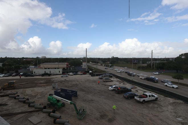 Work progresses on the new FineMark Bank headquarters in south Fort Myers. It was recently topped off with its last steel beam. Construction is ahead of schedule.