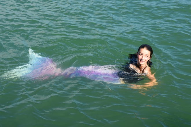 A real live mermaid can also get into the water. Summer Joy Hill, 16, has been donning her mermaid tail and waving to passing boats to cheer people up during the coronavirus pandemic.