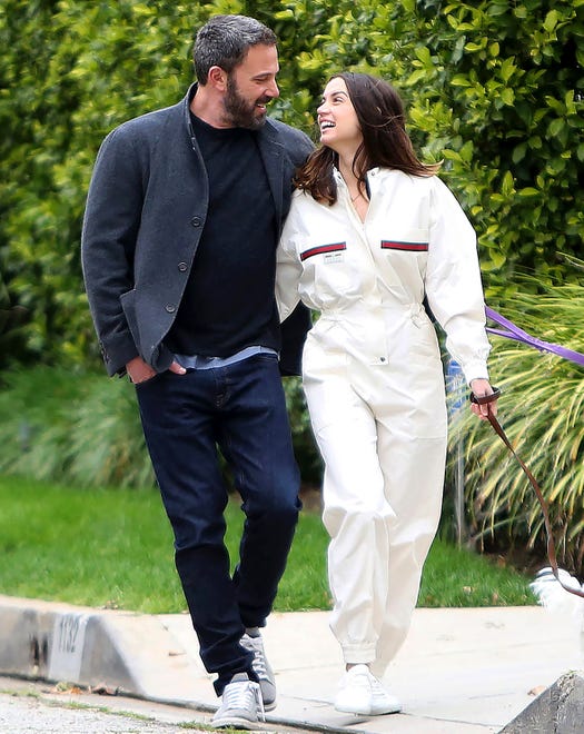 Aww, how cute! Affleck goes for a walk with girlfriend Ana de Armas in 2020. Rumors surrounding their romance peaked in April after they were the subjects of many paparazzi shots in the previous months. In late April, Affleck was seen cuddling up with de Armas in a series of photos posted on her 32nd birthday.