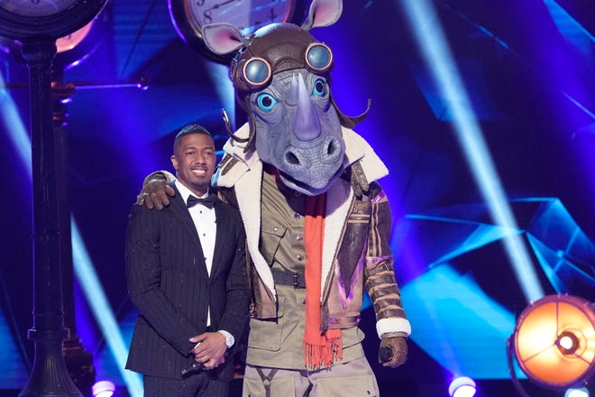 Host Nick Cannon and the "Rhino" on Fox's "The Masked Singer," which Fox is hoping to produce in time for September's schedule.