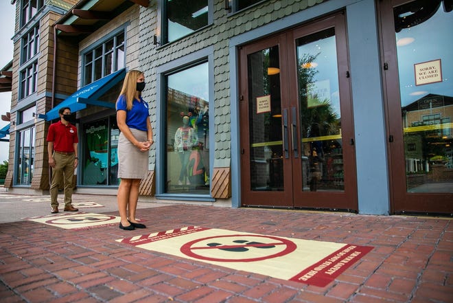Disney Springs, which partially reopened Wednesday, has visible markings on the ground to encourage social distancing. Cast members are required to wear face coverings as well as guests ages 3 and up. The face coverings must fully cover the guests nose and mouth. Costume masks are not permitted.