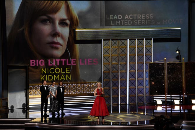 Nicole Kidman accepts the award for lead actress in a limited series or a movie for her role in " Big Little Lies " during the 69th Emmy Awards at the Microsoft Theater.