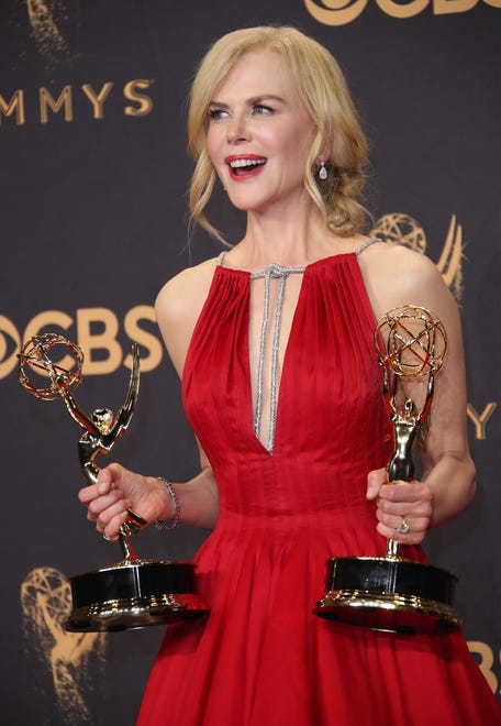 A close-up of Kidman with her Emmy award for Outstanding Limited Series for " Big Little Lies " at the 69th Annual Primetime Emmy Awards.
