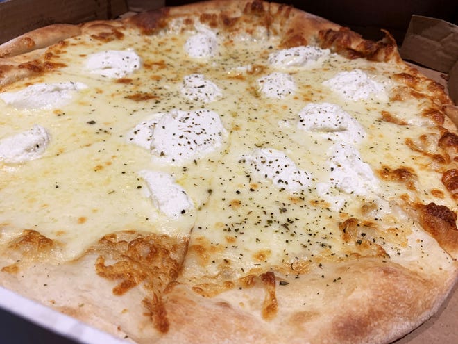 The "Quattro Formaggi" white pizza from the Italian Deli and Market, Marco Island.