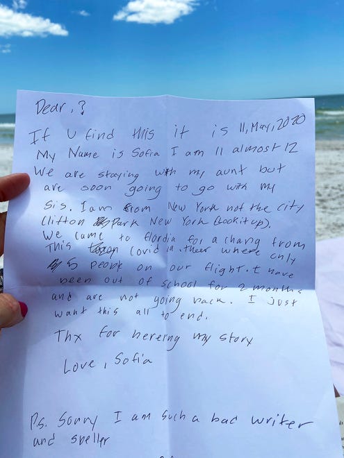 The message, before it went into the bottle. Two young girls from 1,000 miles apart were connected when a message in bottle sent by one was found by the other, prompting communication and dreams.