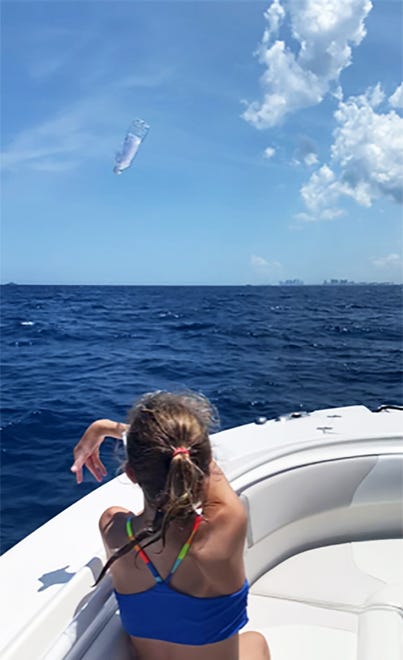 The moment Sofia threw her message into the water is captured. Two young girls from 1,000 miles apart were connected when a message in bottle sent by one was found by the other, prompting communication and dreams.