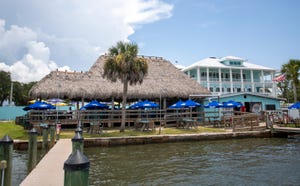 Evie’s at Spanish Point is in Osprey overlooking Little Sarasota Bay. The tiki area is currently open with the new three-story restaurant seen in the background set to open in mid-September. [Herald-Tribune photo / Matt Houston]