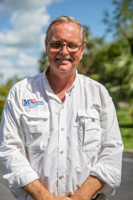 Collier County Commission District 5 candidate Bill McDaniel poses for a portrait while campaigning Tuesday, Aug. 18, 2020, outside St. Agnes Catholic Church in North Naples.