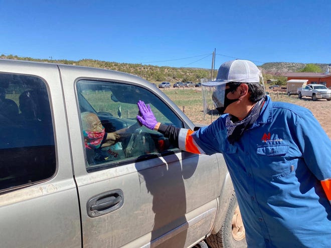 Navajo Nation President Jonathan Nez on May 1, 2020, helped deliver food to families on the Navajo Nation during the COVID-19 pandemic.