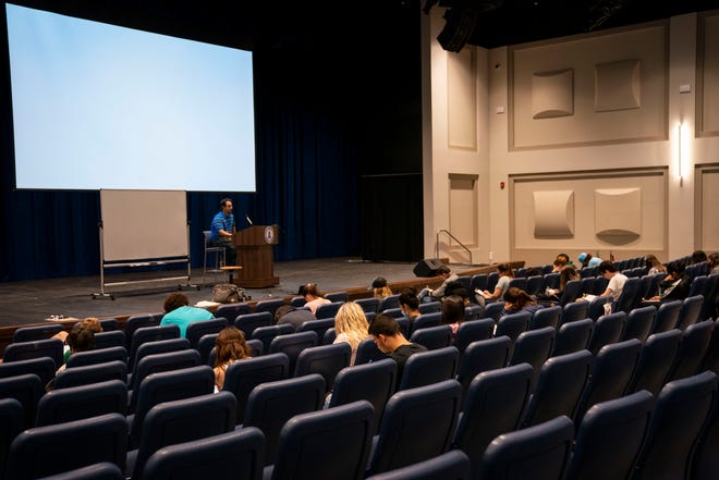 Students take a class in O'Bryan Performance Hall at Ave Maria University on Thursday, September 17, 2020. Small classes are being held in larger spaces than usual to accommodate social distancing.