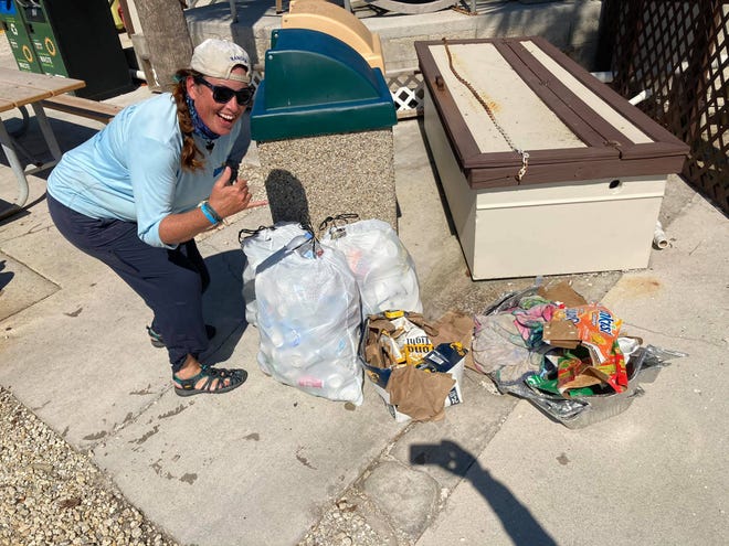 Colleen M. Gill, a tour guide with Florida Adventures and Rentals, spent two hours picking up over 100 pounds of trash left on Dickmans Point, Kice Island on Oct. 14, 2020.