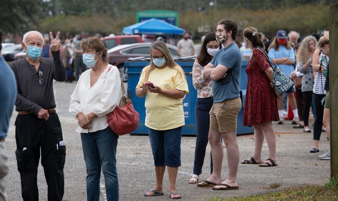 Escambia County voters flock to early voting sites to cast their ballot for the 2020 general election on Monday, Oct. 19, 2020. See more photos .