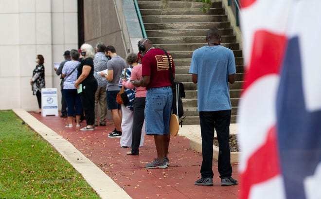 Leon County residents lined up bright and early to cast their ballots on the first day of early voting at the Leon County Courthouse Monday, Oct. 19, 2020.