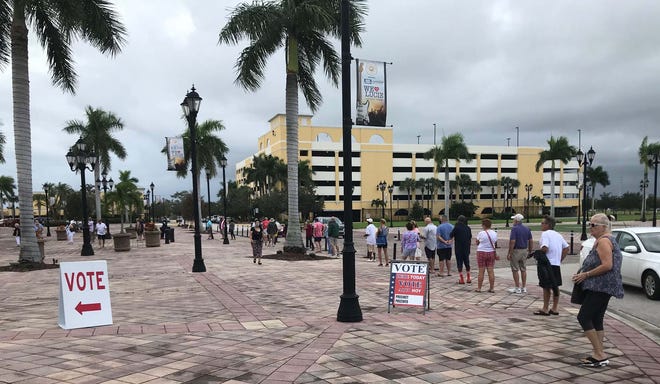 Early voting began Monday, Oct. 19, 2020, in St. Lucie County, Fla. Voters lined up at the MIDFLORIDA Credit Union Event Center in Port St. Lucie beginning at 8 a.m. to vote.