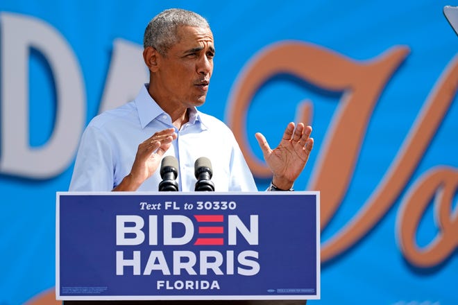 Former President Barack Obama speaks at a rally as he campaigns for Democratic presidential candidate former Vice President Joe Biden Tuesday, Oct. 27, 2020, in Orlando, Fla.