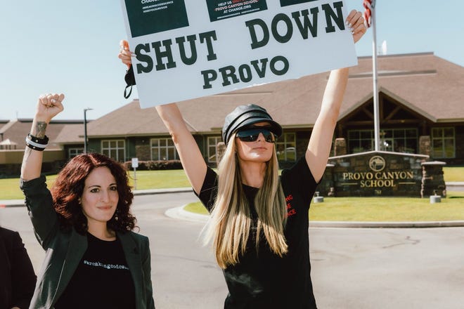 The following month, she attended a protest outside the Provo Canyon School, where she alleged the abuse took place.
