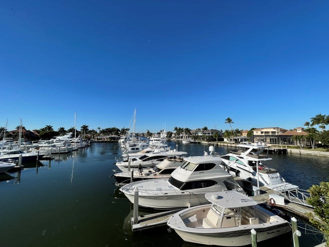 Over 100 boat slips are seen at the Marco Island Marina Association, which is adjacent to the Marco Island Yacht Club, on Jan. 6, 2021. A water canal separates the docks from houses on Martinique Court.