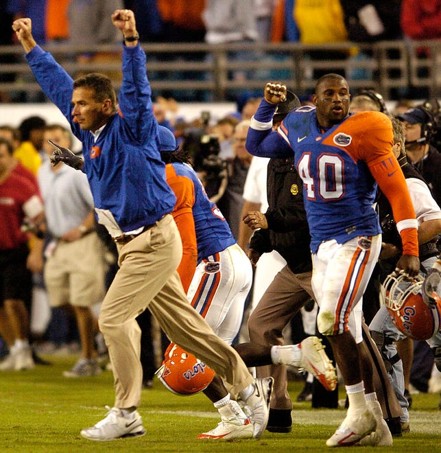 6. In Jacksonville, Urban Meyer is already a winner. During his six-year Gators tenure, he beat Georgia in five of six meetings in the Florida-Georgia game: 14-10 in 2005 (pictured), 21-14 in 2006, 49-10 in 2008, 41-17 in 2009 and 34-31, in overtime, in 2010. His lone loss came in 2007, a 42-30 defeat remembered for the Bulldogs ' mass " Gator Stomp " celebration, swarming the field after Knowshon Moreno ' s opening touchdown.