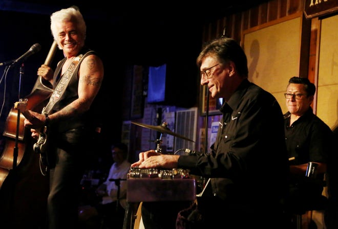 Dale Watson, left, and his band perform for their fans July 22, 2015, at The Station Inn in the Gulch.