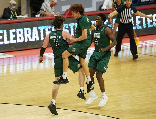 First round: Ohio forward Ben Vander Plas, guard Jason Preston and forward Dwight Wilson III celebrate during the second half of their win against the Virginia Cavaliers at Simon Skjodt Assembly Hall.