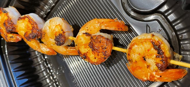 The grilled shrimp for the “Brewhouse Drunken Pasta” from the Marco Island Brewery.