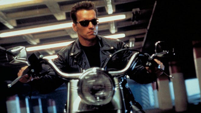 2. " Terminator 2: Judgment Day " (1991) • Director: James Cameron • Cast: Arnold Schwarzenegger, Linda Hamilton, Edward Furlong • Domestic box office: $203.5 million “ Terminator 2 ” excels in many of the aspects that action movie fans appreciate most, such as visual effects and tense action sequences. It stands apart from the average action flick thanks to its refined characters and philosophically intelligent storyline. The movie — which received a 93% rating from critics and a 94% rating from audiences on Rotten Tomatoes — is a haunting tale of post-apocalyptic possibilities and a perfect popcorn action movie rolled in one.