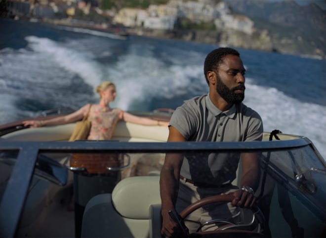 18. " Tenet " (2020) • Director: Christopher Nolan • Cast: John David Washington, Robert Pattinson, Elizabeth Debicki • Domestic box office: $57.9 million “ Tenet ” is a Nolan-helmed thriller about espionage in which a man time travels to prevent World War III. The name of the protagonist, the secret agent (Washington), is never revealed in the movie. About 70% of critics gave the film a positive review, compared to 76% of audiences.