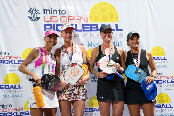 From left to right, Simone Jardim, Lucy Kovalova, Callie Smith, and Catherine Parenteau pose for a photo with their medals after the U.S. Open Pickleball Championships pro doubles final at East Naples Community Park on Saturday, April 24, 2021.