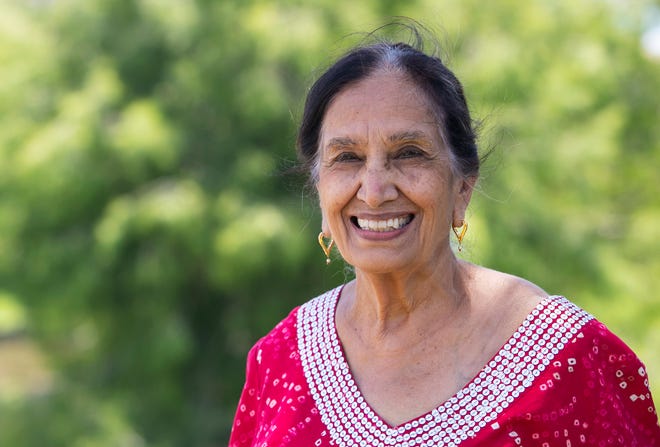 Damyanti Gupta retired to Fort Myers after working as an engineer at Ford Motor Company. She is shown here in her south Fort Myers neighborhood on Thursday, April 29, 2021.