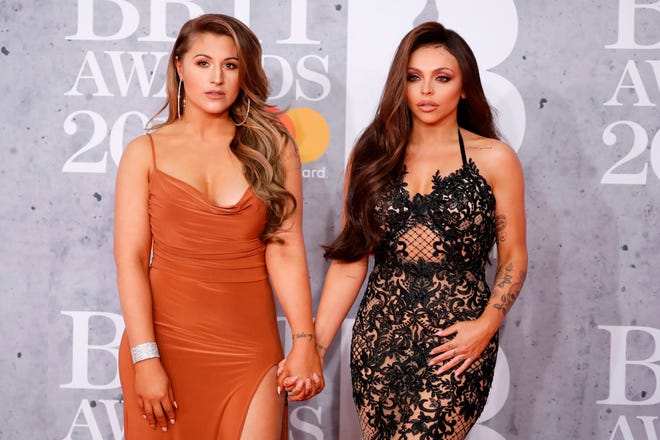 In her first interview since leaving the girl group Little Mix, Jesy Nelson, right, told Cosmopolitan UK in May 2021 that her decision to quit was prompted by comparisons to her bandmates that took a toll on her mental health. " I was bigger than the other three, and there ' s never really been that in a girl group, " she told the magazine. " I was classed as the obese, fat one. " Looking back, she said, " I can ' t believe how miserable I was.