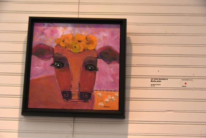 “The cows seemed to name themselves,” said Jo-Ann Sanborn. This one called herself Belle. Marco Island artist Jo-Ann Sanborn is having an exhibit of her cow paintings, titled “Florida on the Hoof,” at Roberts Ranch museum in Immokalee.