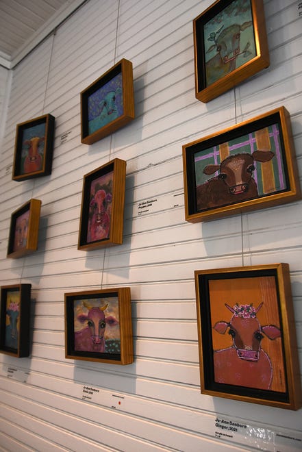 Sanborn’s cows herd together on the beadboard walls of Roberts Ranch. Marco Island artist Jo-Ann Sanborn is having an exhibit of her cow paintings, titled “Florida on the Hoof,” at Roberts Ranch museum in Immokalee.