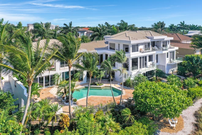 This rare contemporary mansion fetched nearly $12 million, a record sale on Marco Island.