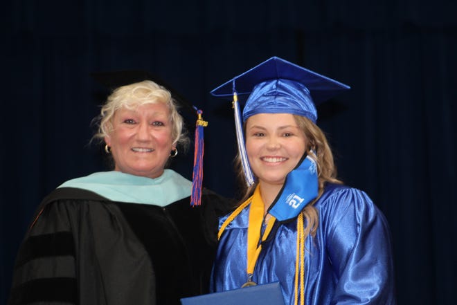 Everglades City School Principal Cheryl Allison poses with Lexie Hendrickson at graduation on Friday, May 28, 2020, in Everglades City.