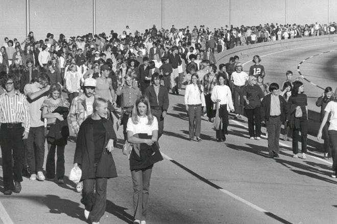 Nov. 21, 1971: An estimated 20,000 participants cross the Hart Bridge þ Ä ô s southbound lanes as part of the Walk for Mankind, a 20-mile fundraising walk. Proceeds from the event benefit Project Concern, an international relief organization to provide medical facilities for the poor in the United States and overseas.