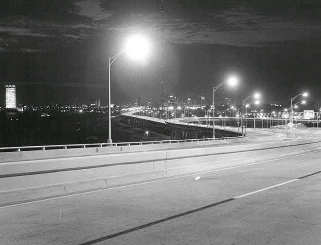 April 28, 1972: Lights illuminate the empty approach to the Hart Bridge as crews perform work on the bridge.