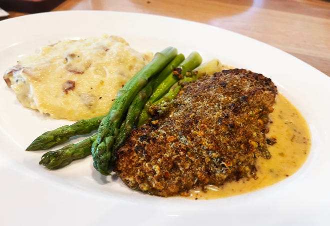 The pistachio-crusted grouper from Cooper’s Hawk Winery & Restaurant in North Naples.