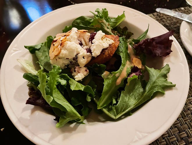 The warm almond-crusted goat cheese salad from Marek's Bar & Bistro, Marco Island.