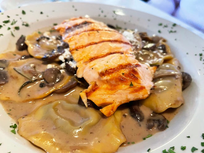The porcini mushroom and goat cheese ravioli with salmon from Arturo’s Bistro, Marco Island.